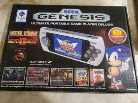 Atgames Digital Media Inc Gp2628-80m At Games Sega Genesis Ultimate Portable Game Player. Plastic Still On Screen