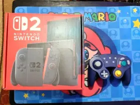 120833 Nintendo Switch 2 Console Mario Kart World Gamecube Controller Bundle In Hand