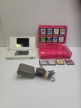 Nintendo 41033801 Ds Lite Handheld System And 8 Game Bundle. Unit Not Powering Up. As Is