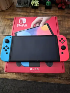Nintendo 666186642047 Switch Oled Model With Neon Red And Blue Joy-con