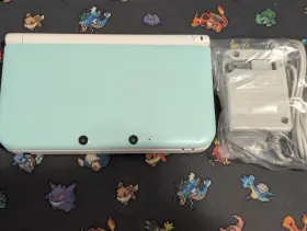 Nintendo 902370520651 3ds Xl Mint Green/white - With Pokemon Bank Charger/stylus And 10 Games