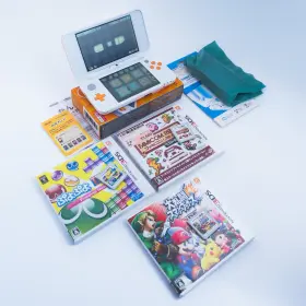 Nintendo 902370536690 New 2ds Ll Xl White Orange With Adapter And Games - Near Mint X