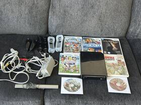 Nintendo Ku62180935 Wii Console Black 2 Controllers Nunchuks Sensor Bar And 7 Games