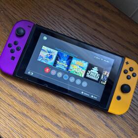 Nintendo Xaw10044707094 Switch With Purple And Orange Joycons