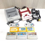 Nintendo Japanese Super Famicom & Console Bundle With 6 Games Cables Used. Price: $114.99.