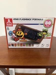 New Atari Flashback Portable Player Woodgrain With 80 Games - Rare. Price: $78.00.