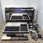 Texas Instruments TI-99/4A Home Computer Box Tested W Cables And Games. Price: $170.00.
