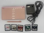 Nintendo Lite Coral Pink Console Bundle 5 Games, Charger, And Stylus Works Used. Price: $99.99.