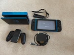 Nintendo Switch 32GB Black Wireless Handheld System Dbrand Cover XAW100 Used. Price: $160.00.