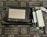 Nintendo Wii Deluxe Black Console Gaming System WUP-101(02) Tested/working Used. Price: $134.99.