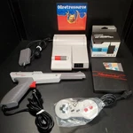 Nintendo NES-101 Top Loader Console W/game, Dogbone Contr. Zapper-cplt Restored Used. Price: $279.99.