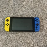 Nintendo Switch V2 Video Game Console HAC-001(-01) Fortnite Wildcat Edition Used. Price: $130.00.