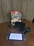 Nintendo Switch (oled Model) Super Smash Bros. Bundle 64GB Console - Gray Box Used. Price: $250.00.