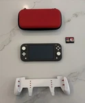 Nintendo Switch Lite Console Combo Gray Used. Price: $174.99.