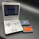 Nintendo Boy Advance Sp Handheld System With 2 Games New Battery No Charger Used. Price: $100.00.