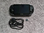 Sony Playstation Vita PCH-1001 Black Handheld System W/ 16GB Memory Card Used. Price: $165.00.