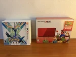 Nintendo 3DS Flame Red System Bundle With Five Games Cib Open. Price: $375.00.