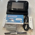 Nintendo Wii WUP-101(02) Black 32GB Console With Gamepad & Remotes Used. Price: $150.00.