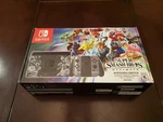 Nintendo Switch - Super Smash Bros. Ultimate Edition Console Bundle Used. Price: $850.00.