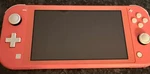 Nintendo Switch Lite Pink Console + Charging Stand/dock - Works Great Used. Price: $114.99.