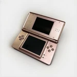 Nintendo Ds Lite Video Game Console - Metallic Rose Used. Price: $59.00.