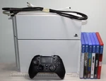 Sony PS4 Glacier White Console Model CUH-115A W/6 Games, Remote, Cords Used. Price: $149.99.