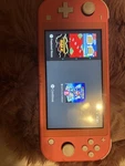 Nintendo Switch Lite Coral Pink Handheld Console System Like. Price: $150.00.