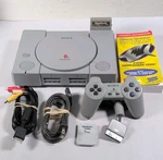 Sony Playstation PS1 Console SCPH-7001 Tested Oem Controller W/ Gameshark Used. Price: $65.00.