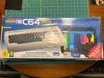 Factory Sealed The C64 Maxi Retro Micro Computer Console Commodore & Joystick New. Price: $300.00.