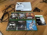 Microsoft Xbox One 1TB White Console W/ Controller Seven Games Bundle Used. Price: $240.00.