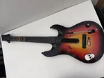 Guitar Hero Redoctane 95457.805 Xbox 360 Controller Sunburst Tested Used. Price: $69.00.
