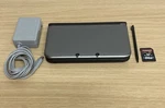 Nintendo 3DS Ll Silver Console Charger Stylus 64GB Sd Card Tested Used. Price: $239.99.