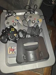 Nintendo 64 Console W/ Game Bundle Used. Price: $110.00.