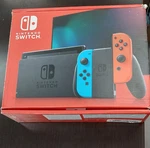 Used Nintendo Switch With Neon Blue And Red Joy Con. Price: $200.00.