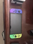 Nintendo Switch Oled Splatoon Edition Console With Joy-con, Case, Charger, Grip, Open. Price: $339.00.
