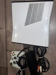Xbox 360 Slim 4GB Special Edition White Model With Cords And Controller Used. Price: $112.38.