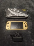 Nintendo Switch Lite Zelda Hyrule Edition Console + Case Charger Used. Price: $199.56.