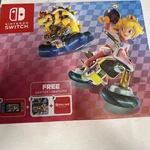 Nintendo Switch Console,tv Dock Station, Does Not Come With Mario Kart Game Used. Price: $219.00.