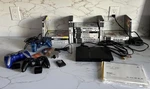 Sony Playstation Slim Console (SCPH-70001) + 23 Sports Games, Controllers Read Used. Price: $195.00.