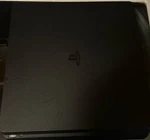 Jet Black PS4 Slim Used. Price: $120.00.