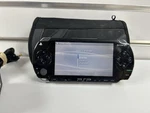 Sony Playstation Portable Psp Handheld System - Tested & Reset W/ 8 Used. Price: $150.00.