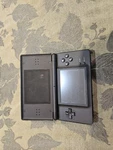 Nintendo Lite Handheld System - Onyx Black Used. Price: $64.00.