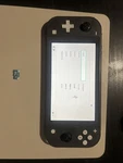 Nintendo - Switch 32GB Lite Handheld Gray With 64 Sd Card Used. Price: $99.99.