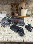 Nintendo N64 Funtastic Smoke Grey System Console + Oem Controller W/expansion Used. Price: $190.00.