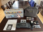 Oringinal Atari Lynx/full Set W/box,carrying Case, Original Papers W/6 Games Used. Price: $450.00.