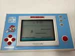 Nintendo Game And Watch Super Mario Bros 1988 Model YM-105 Ec Works! Used. Price: $159.00.