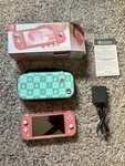 Nintendo Switch Lite 32 Gaming Console - Coral (pink) W/box And 128GB Sd Card Used. Price: $144.95.