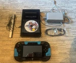 Nintendo Wii 32GB Black Deluxe Console WUP-101(02) With Gamepad And Open. Price: $150.00.