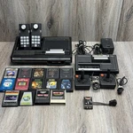 Coleco Console + Expansion Module #1 (2405), Controllers W 14-GAMES As-is Used. Price: $175.00.