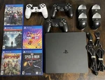 Sony PS4 Slim 500GB Console Bundle W/ 3 Dualshock Controllers & Games Open. Price: $300.00.